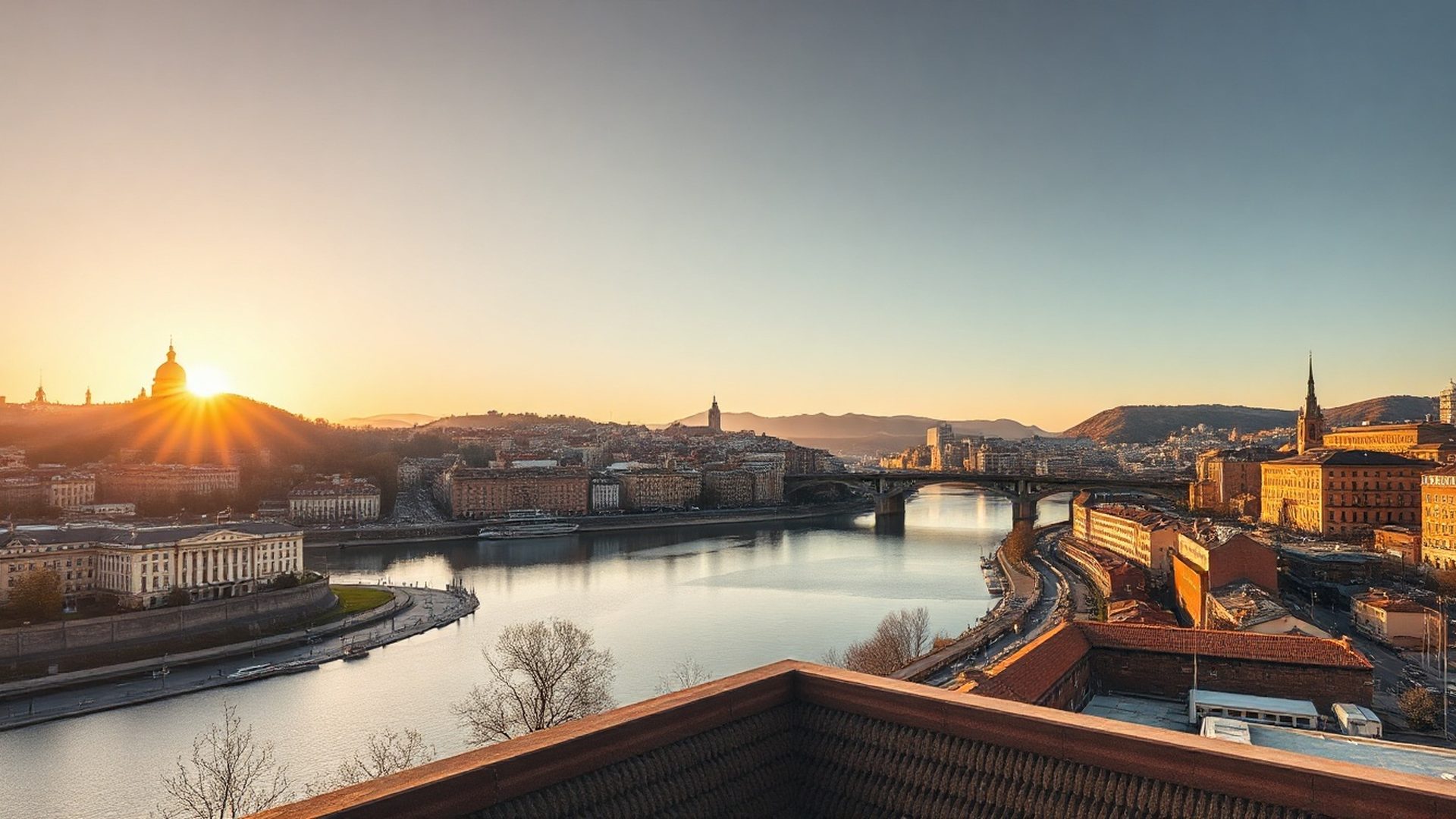 Panorámica del Bilbao industrial y el río Nervión al atardecer